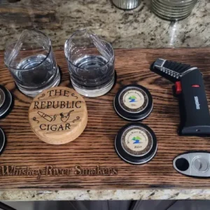 Pieces of glasses on a wooden rack with a lighter